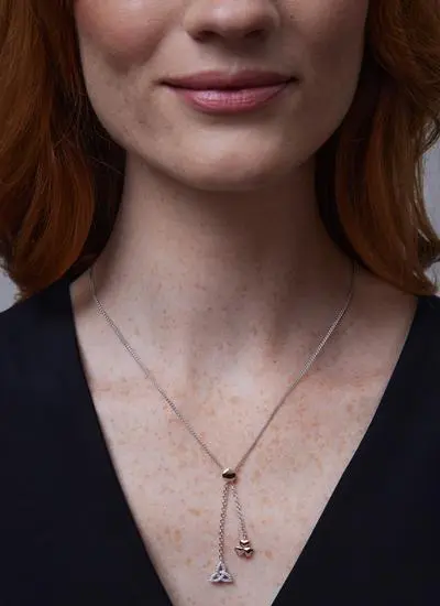 Close up of red haired woman wearing Shamrock 